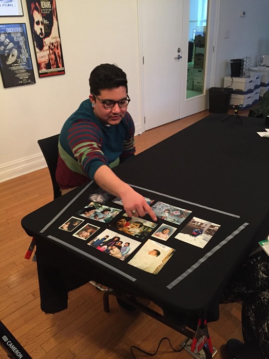 Cecilio Escobar, interview about his family photographs for the Family Camera Network, 2017, digital image, Courtesy of The Family Camera Network, the Canadian Gay and Lesbian Archives and Cecilio Escobar. Photographer: Celio Barreto