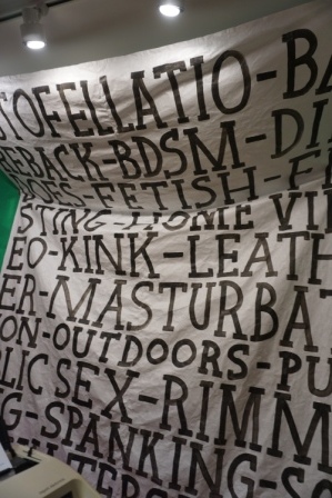 sex acts written on cloth signage