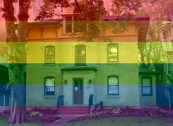 The ArQuives house with pride flag image overlay