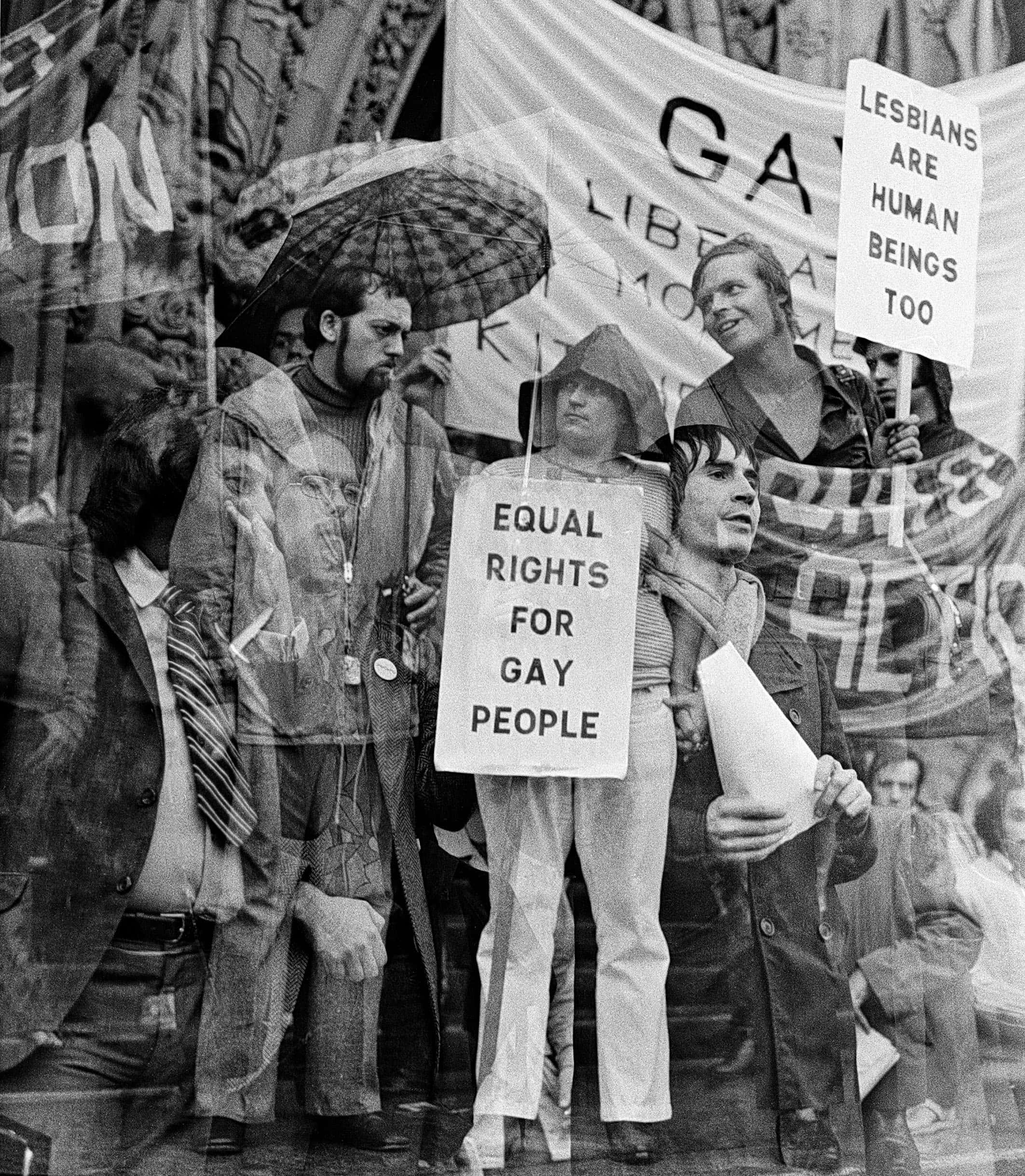 protesters at the We Demand protest in Ottawa 1971 hold a sign that says "Equal Rights for Gay People"