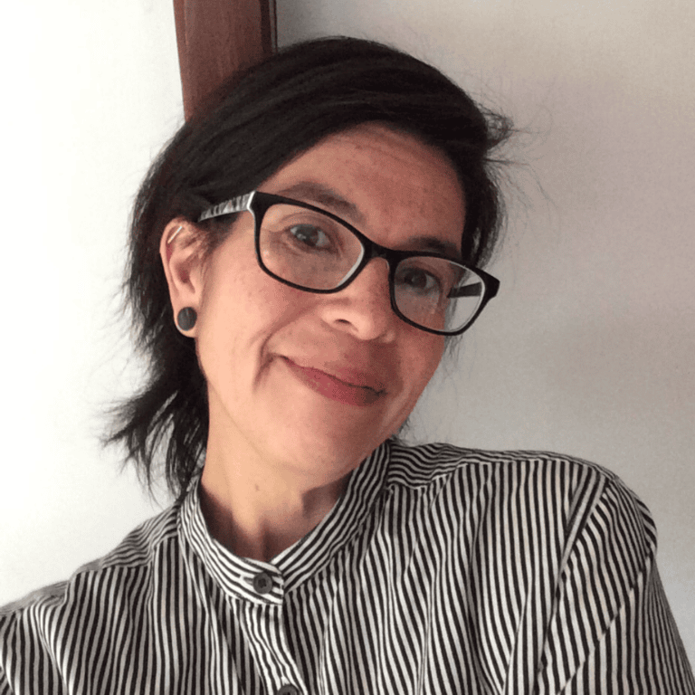 Andi Canales' headshot.