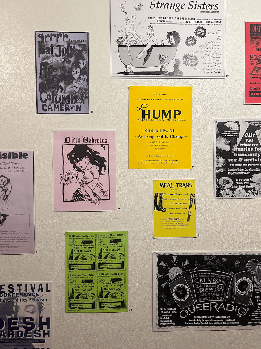 Various posters on a wall.